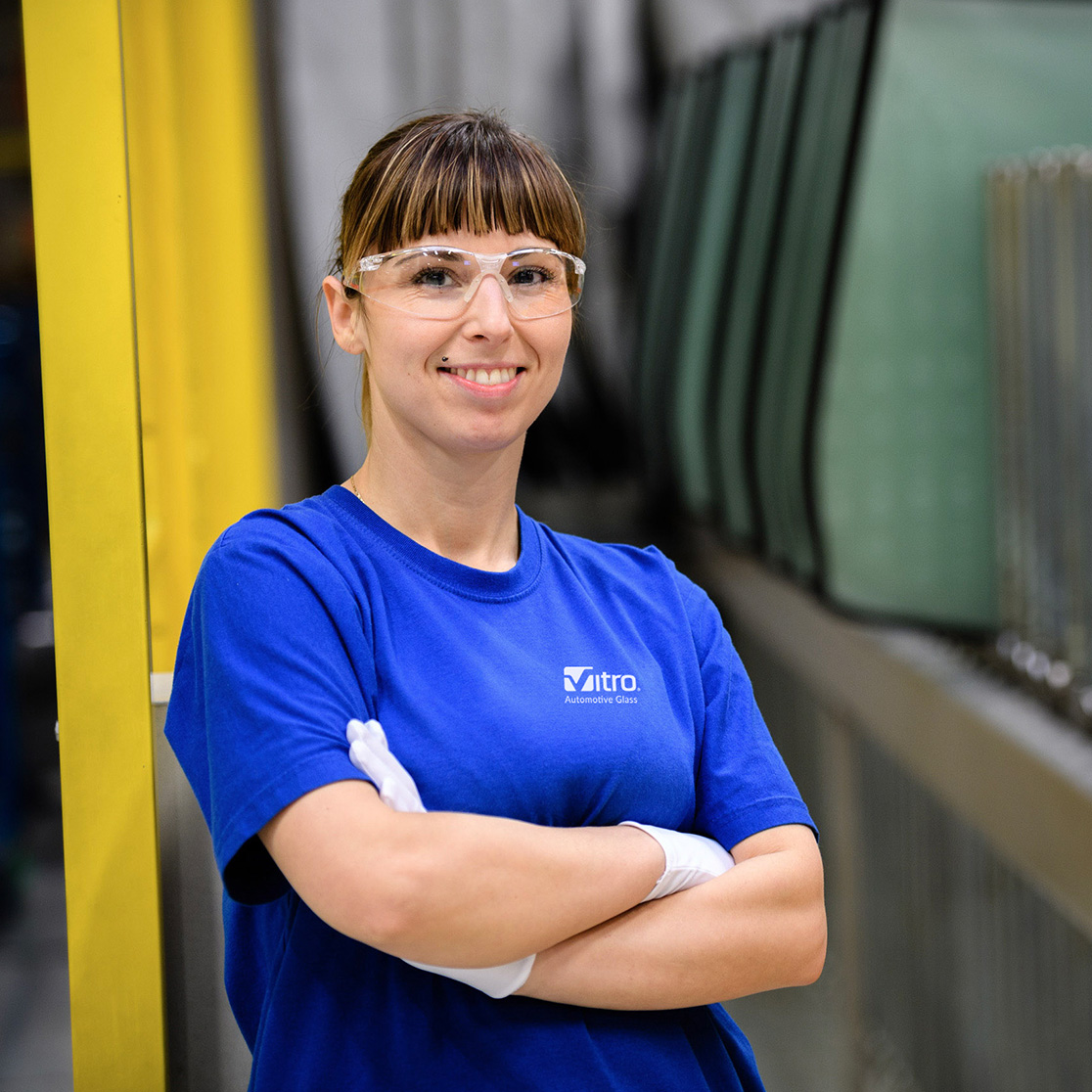 Girl at a glass factory